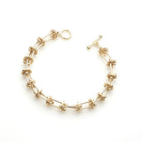 Interpolation Gold Bracelet