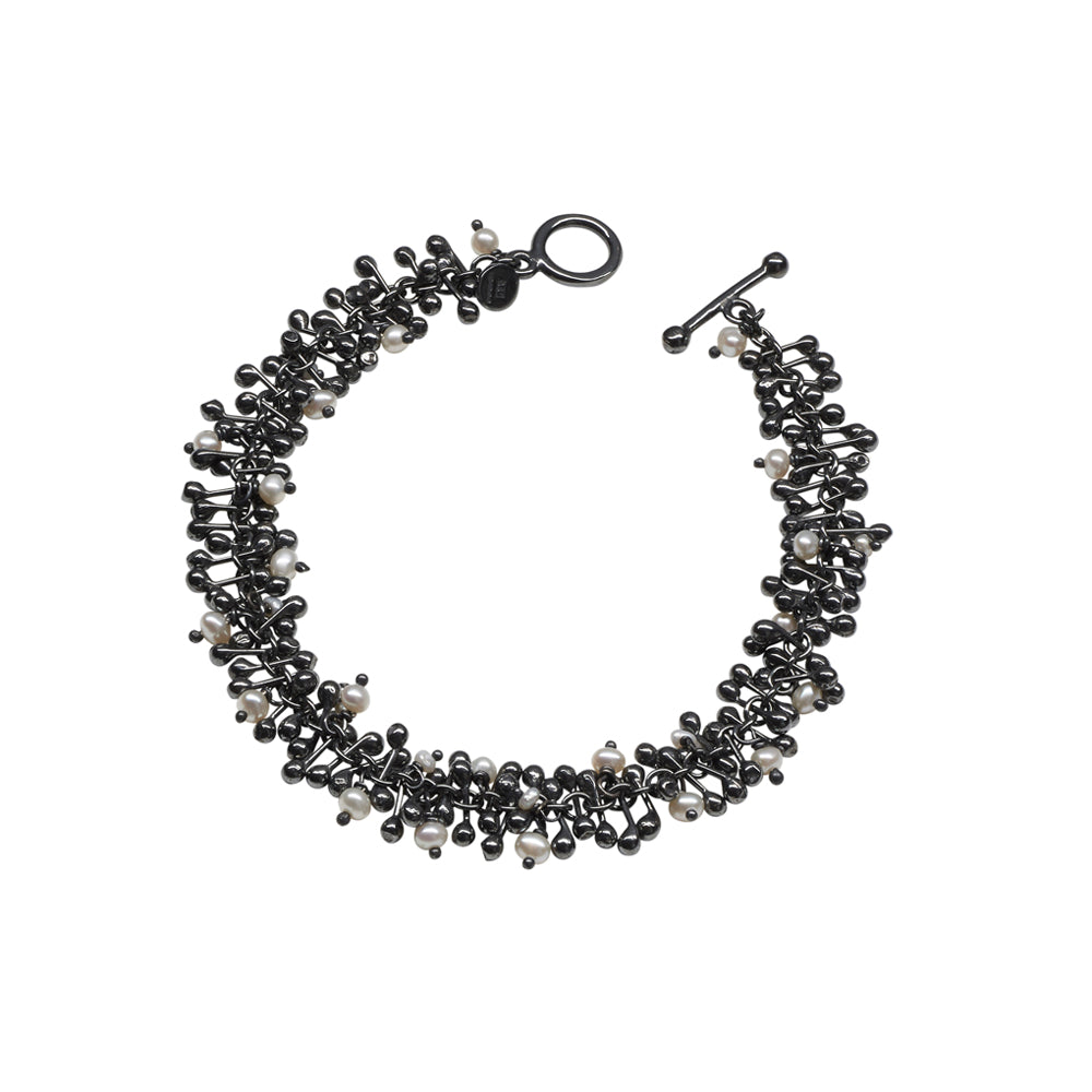 Freshwater pearls and oxidised silver beads. Contemporary fine jewellery that is handmade by Yen Jewellery