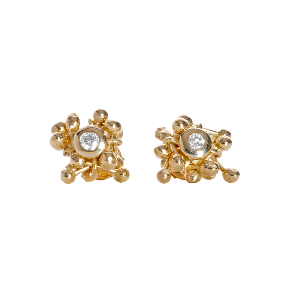18ct gold and diamond cluster stud earrings. Gold elements surround a central diamond. Handmade by Yen Jewllery