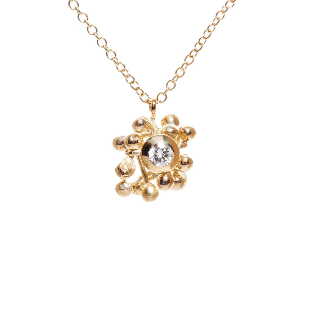 18ct gold and diamond necklace.  A rich gold cluster of elements and one central diamond. Handmade by Yen Jewellery
