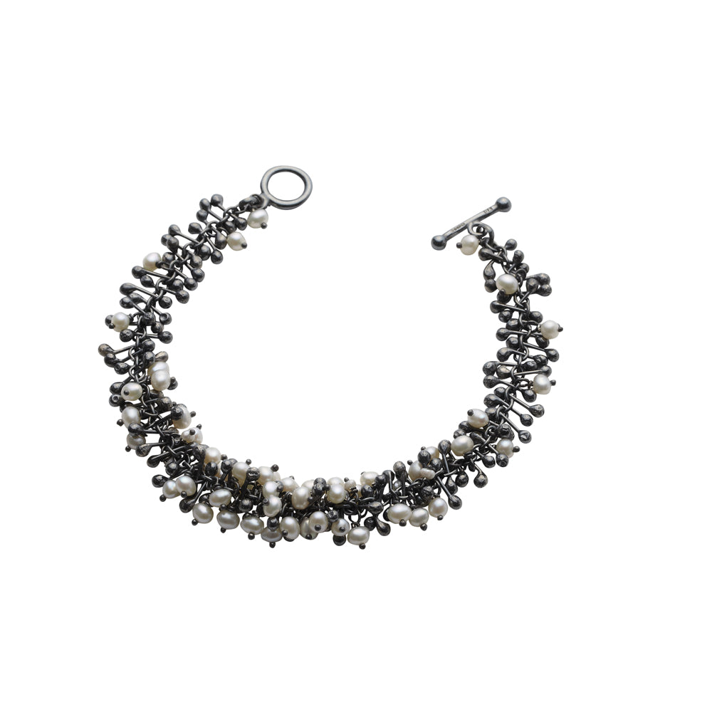 Oxidised silver beads and freshwater pearls. Every component is handmade by Yen Jewellery in her studio