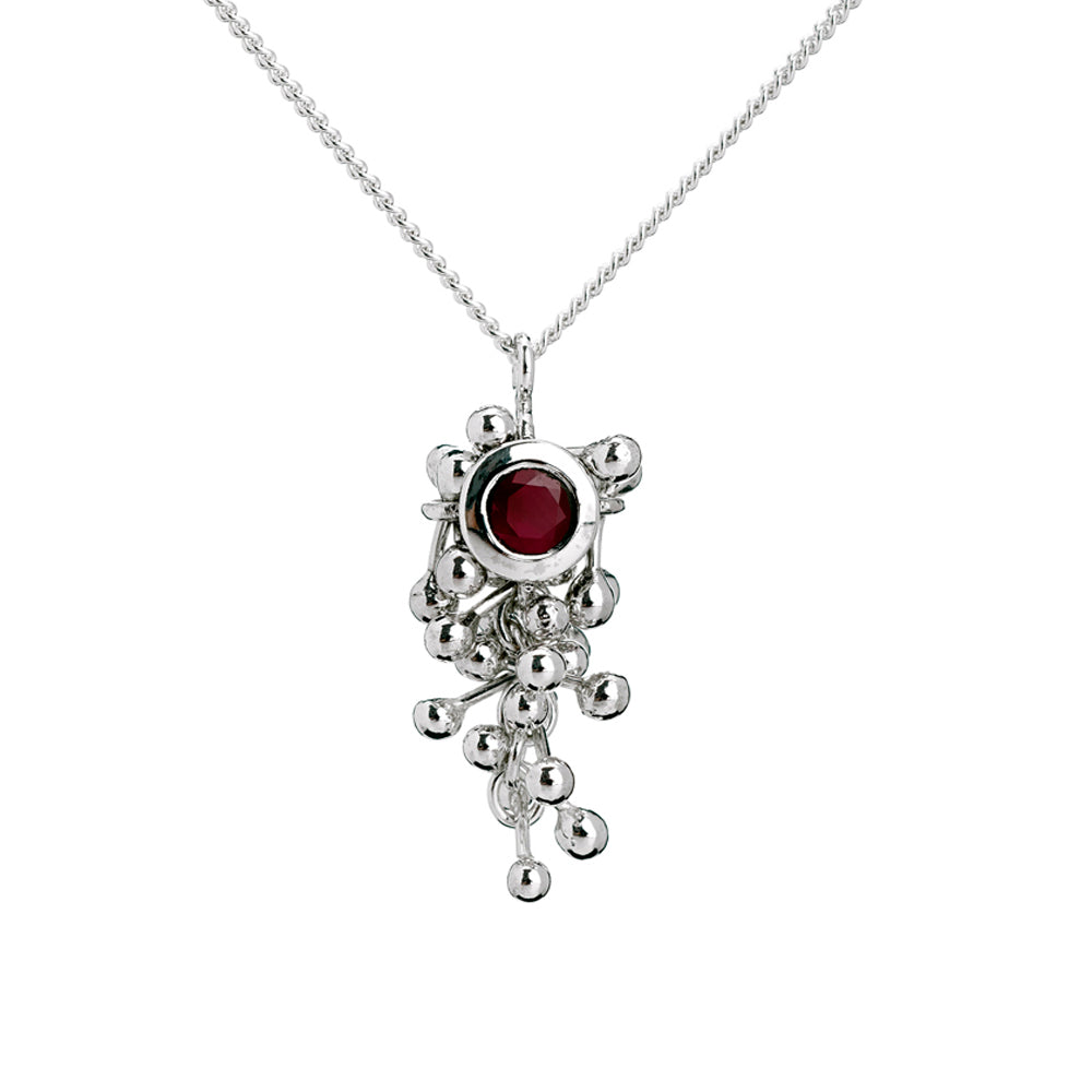 Yen Jewellery A contemporary handmade ruby and silver necklace. Hangs off a chain.